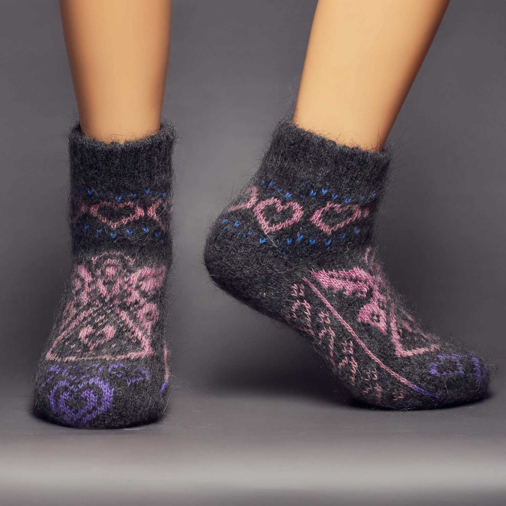 Low-cut warm goat hair black, pink, and purple socks with an angel and hearts design - front view.