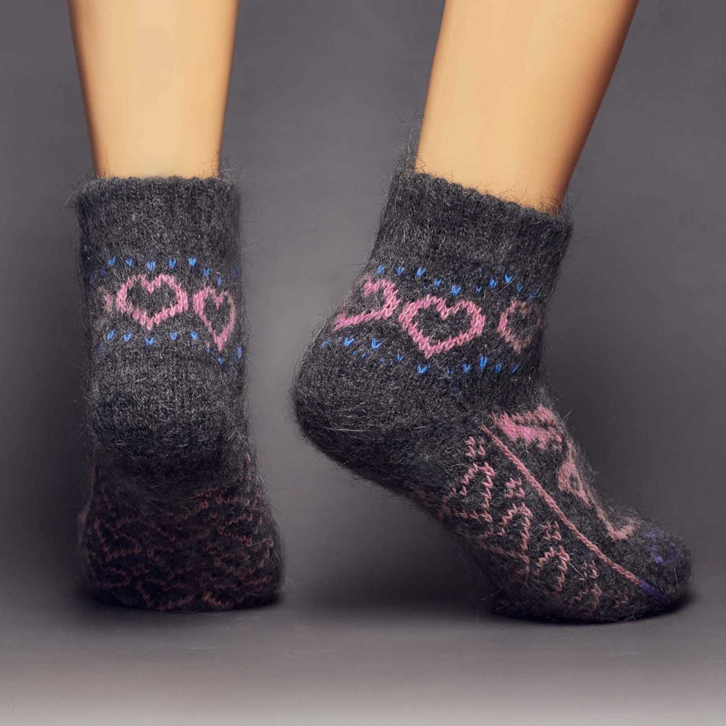 Low-cut warm goat wool black, pink, and purple socks with an angel and hearts design – back view.