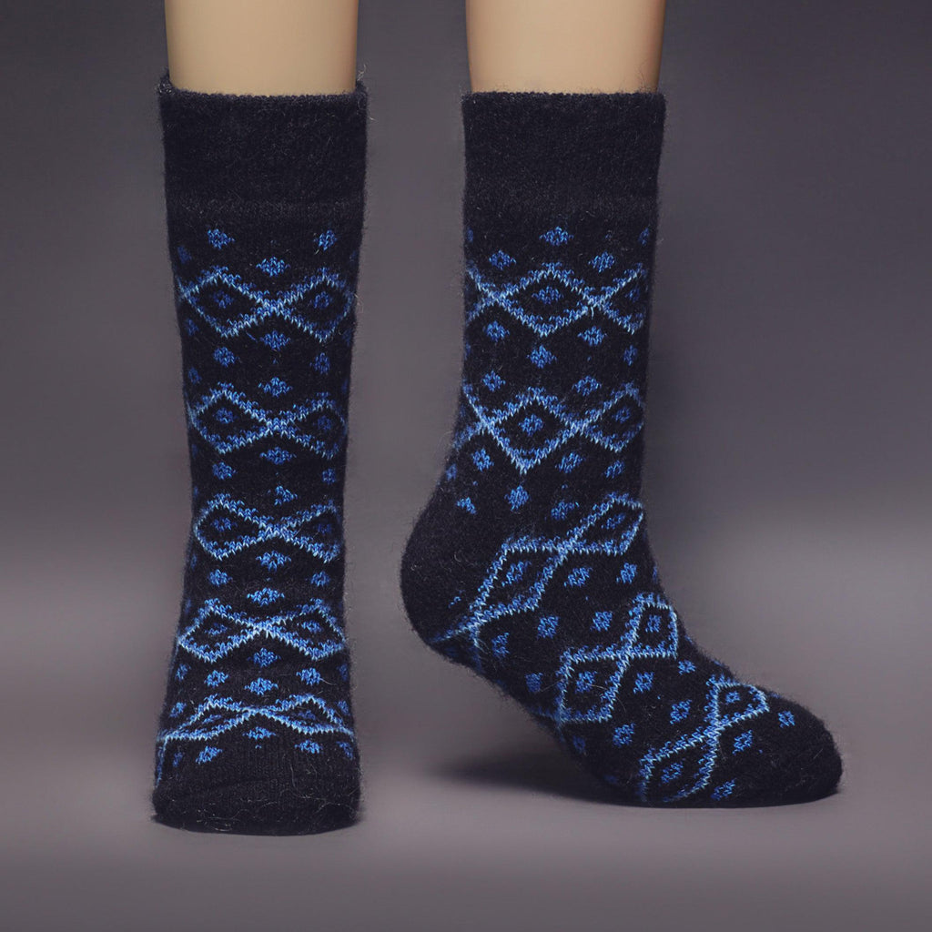 Man's merino wool black thick crew socks with blue diamond-shaped ornament - front view.