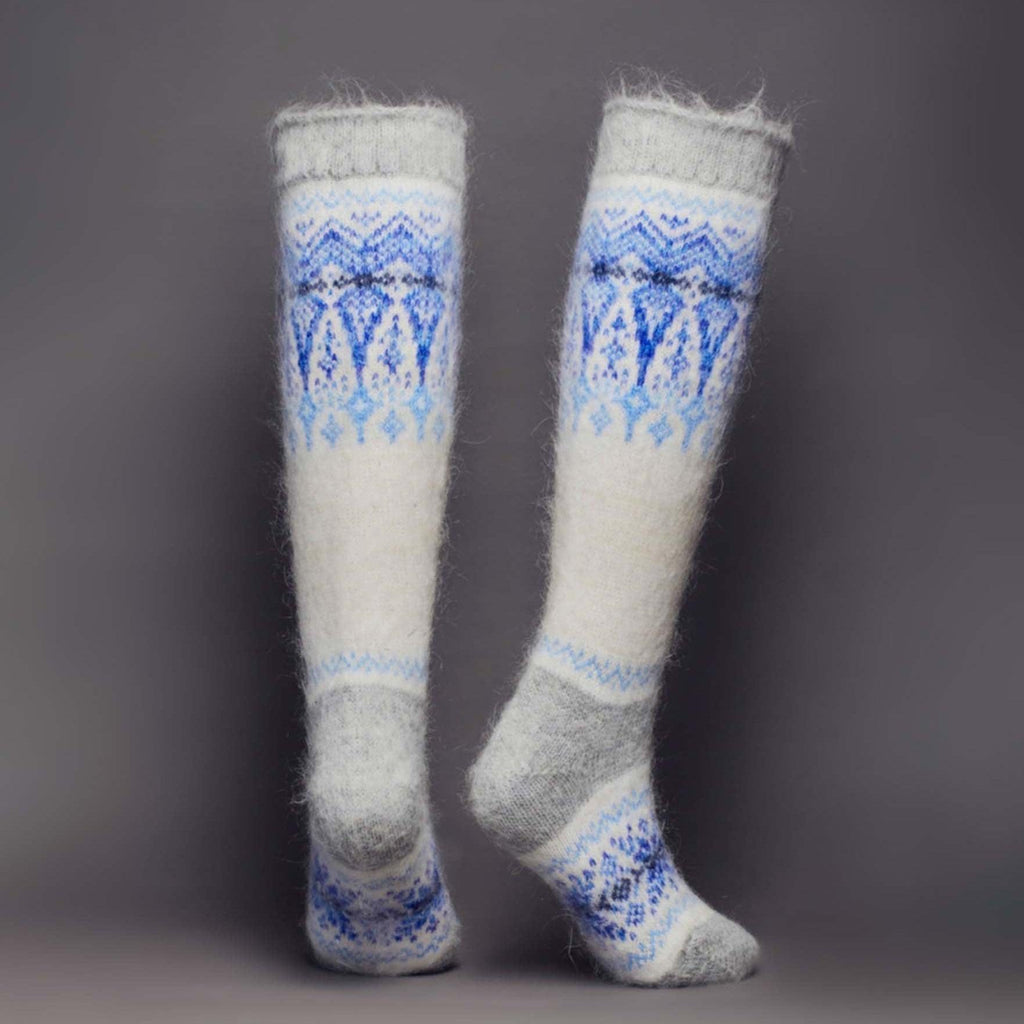 Goat hair white and grey knee-high no elastic socks with blue winter ornament - back view.