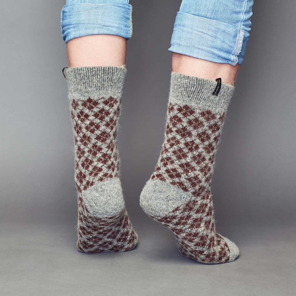 Grey crew merino wool socks with brown a diamond-shaped pattern – back view.