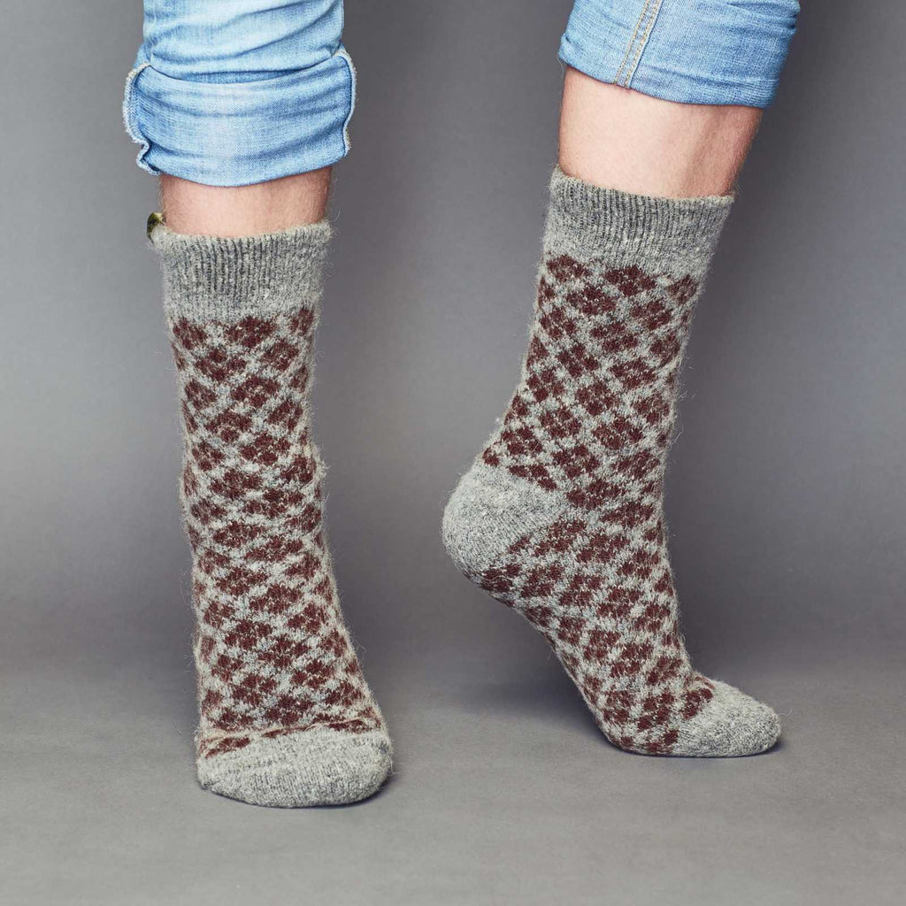 Smokey grey crew wool socks with a brown, diamond-shaped pattern - front view.