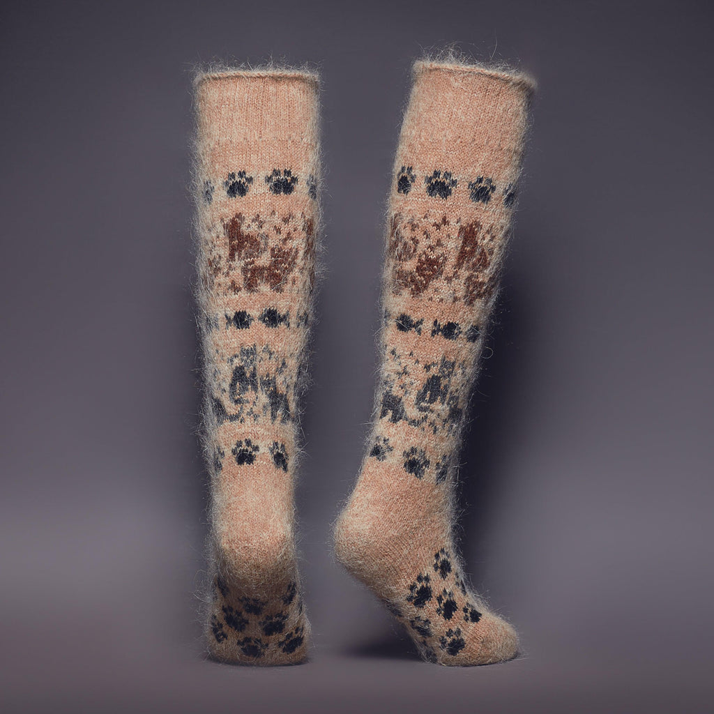 Fuzzy goat wool light-brown boot socks with dark cats and dogs pattern - back view.