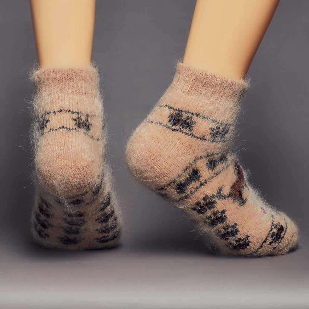 Low-cut goat hair light-brown thick socks with puppies and paw prints - back view.