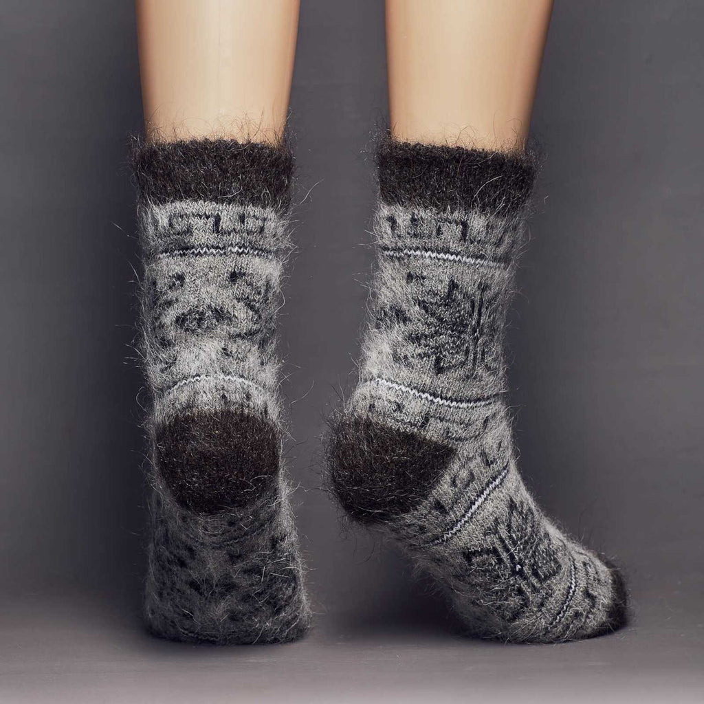 Fuzzy dark-grey goat hair thick crew socks with geometric designs - back view.