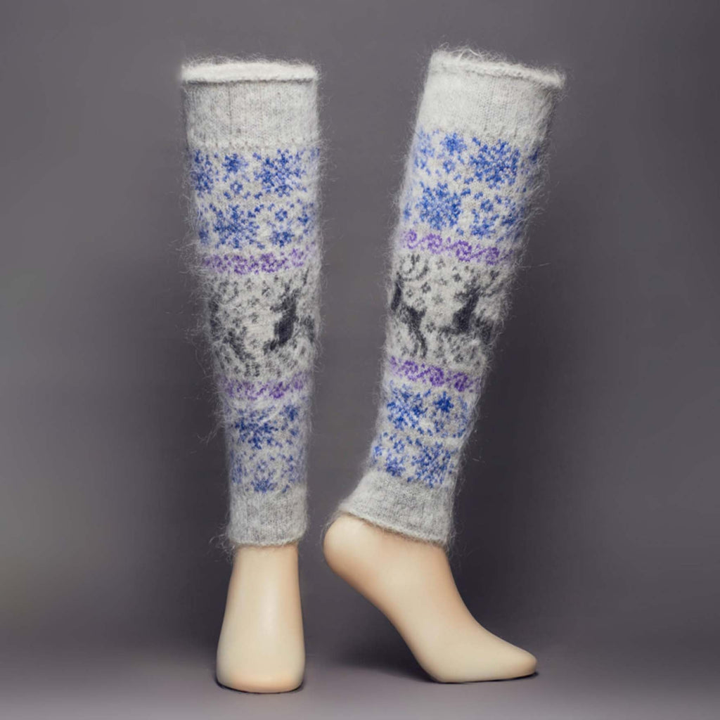 Warm goat hair grey leg warmers with deer and blue snowflakes - front view.